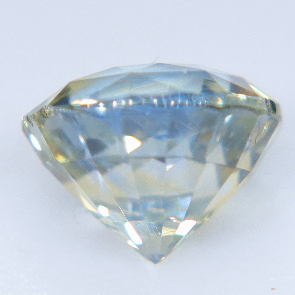 Side view of 1.22 carat natural Ceylon bi-color sapphire