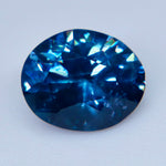 Side profile of the oval cobalt blue spinel showing its 4.27 millimeter depth