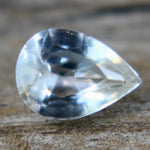 Natural pear-cut white sapphire under daylight – authentic Ceylon gemstone