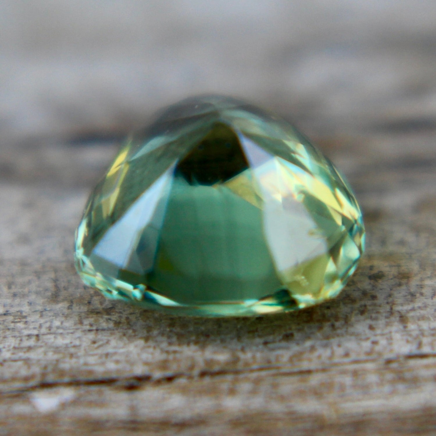 Unheated Ceylon green sapphire 6.15×5.80×3.52 mm – earth-sourced faceted gemstone