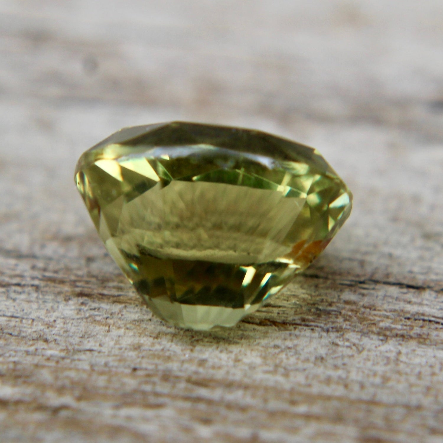 Untreated natural green sapphire oval cut faceted gemstone cut and polished stone