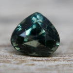 Faceted pear-cut green sapphire with bright saturation