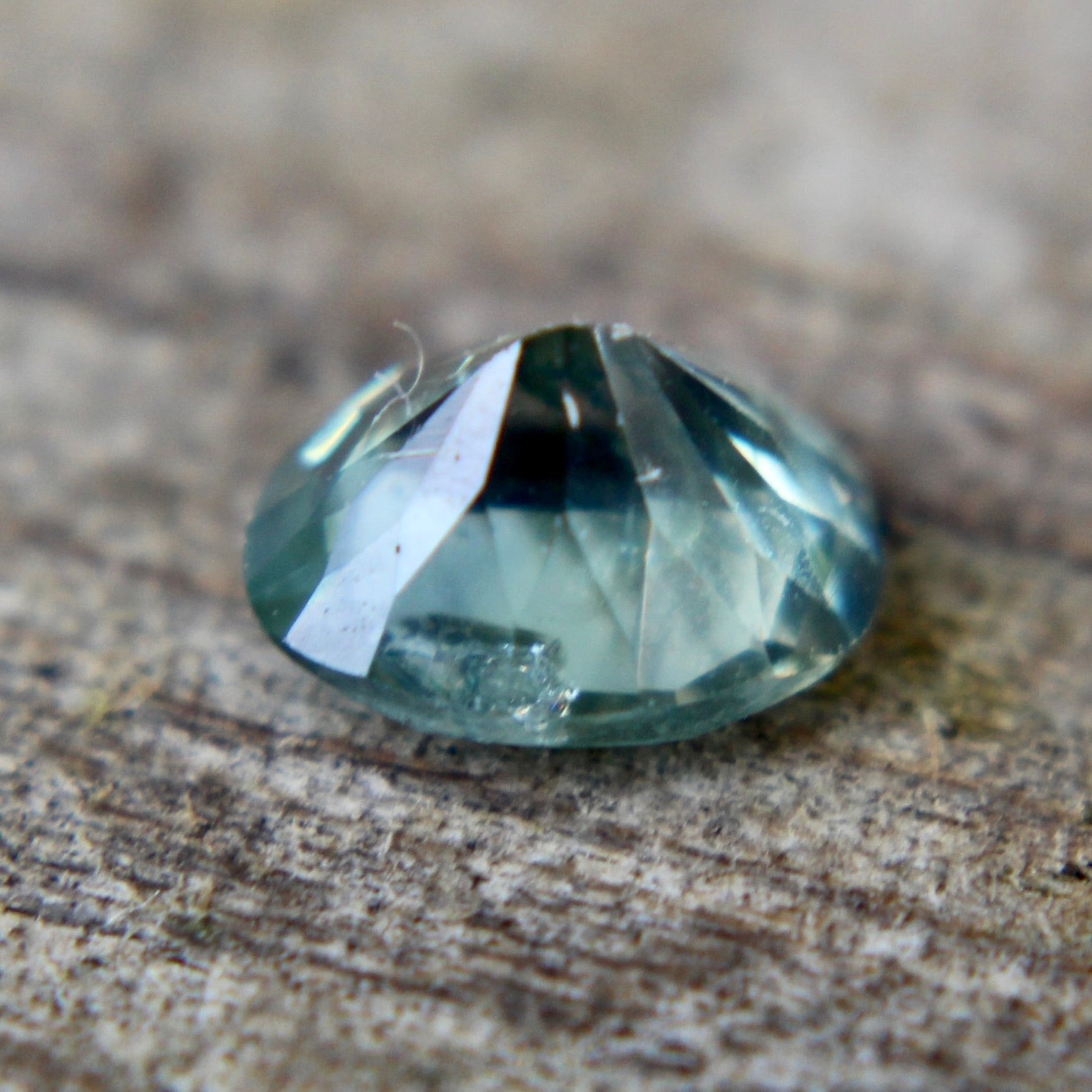 Natural untreated green sapphire oval 5.58x4.58x3 mm