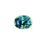 Profile view of 1.50 ct green sapphire oval showing pavilion and depth (7.22 × 5.42 × 4.90 mm)
