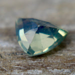 Unheated green sapphire 5.15×4.44×2.83 mm – side profile