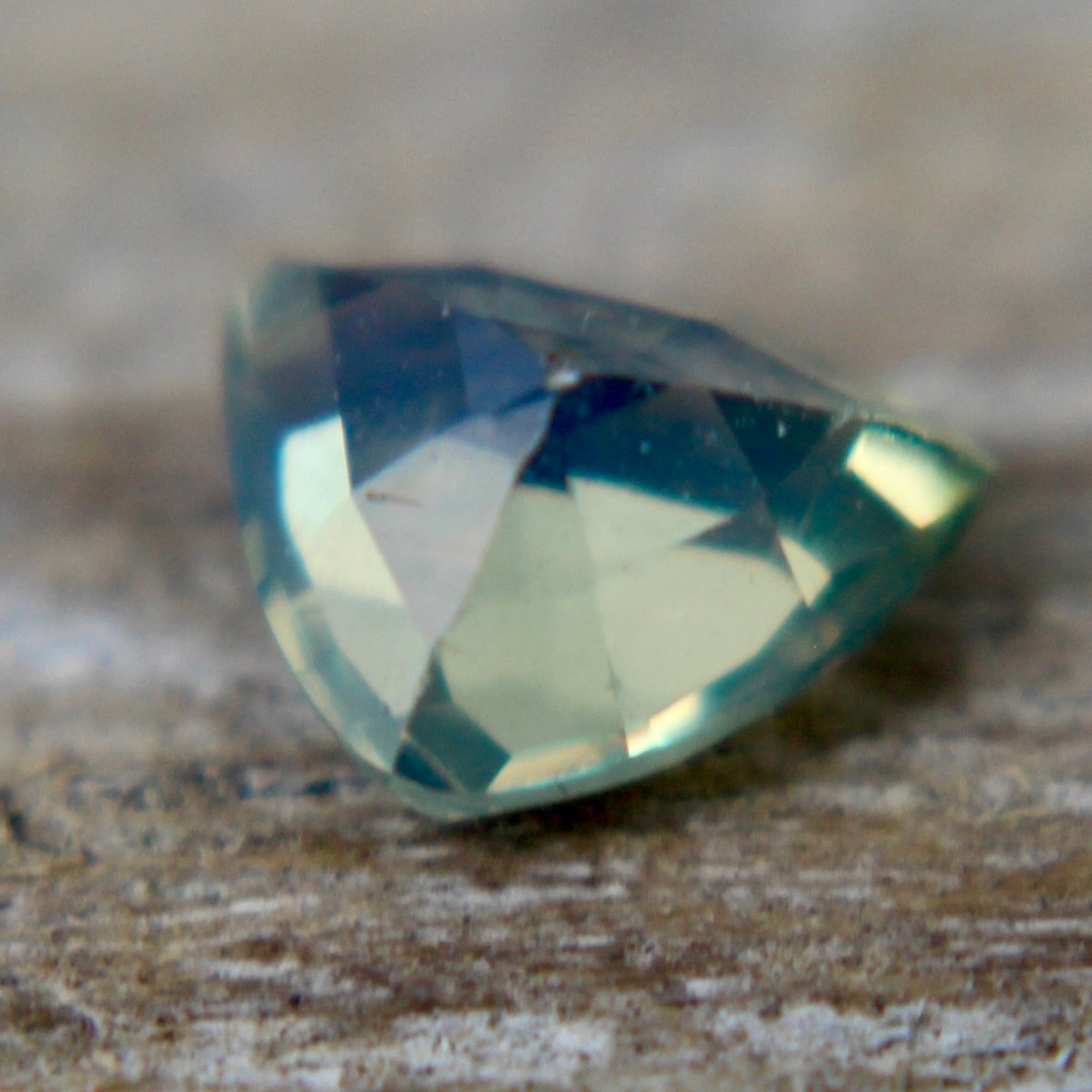 Unheated green sapphire 5.15×4.44×2.83 mm – side profile