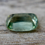 Loose green sapphire 6.04x4.19 mm VS clarity cushion faceted stone