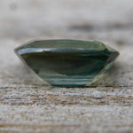VS clarity natural green sapphire cushion faceted gemstone