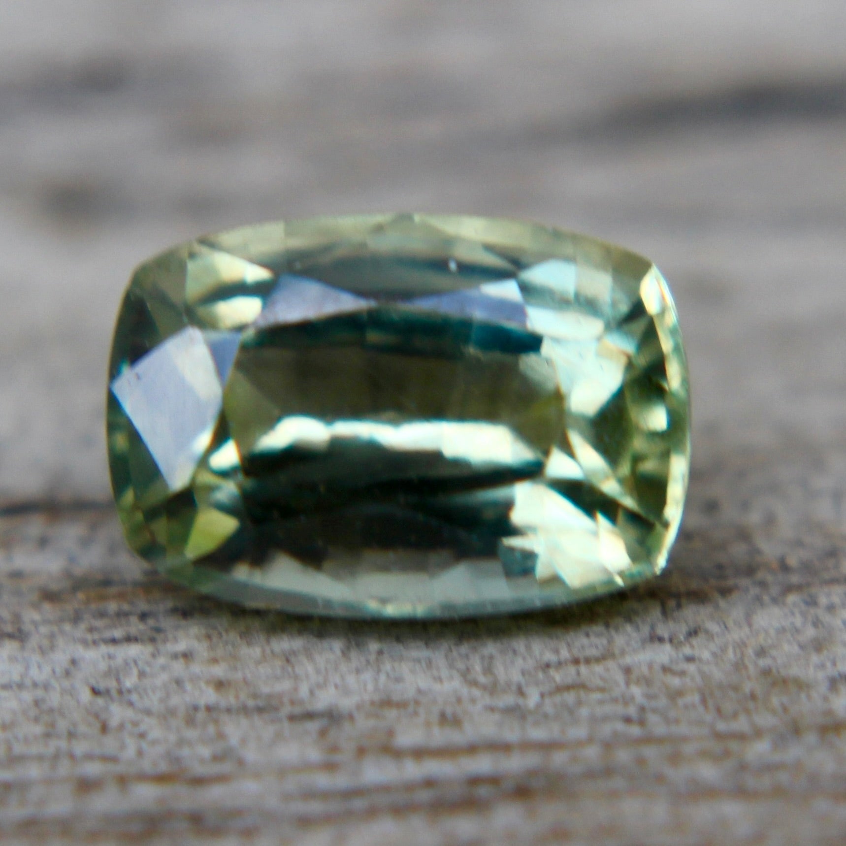 Madagascar green sapphire loose gemstone with authenticity confirmation
