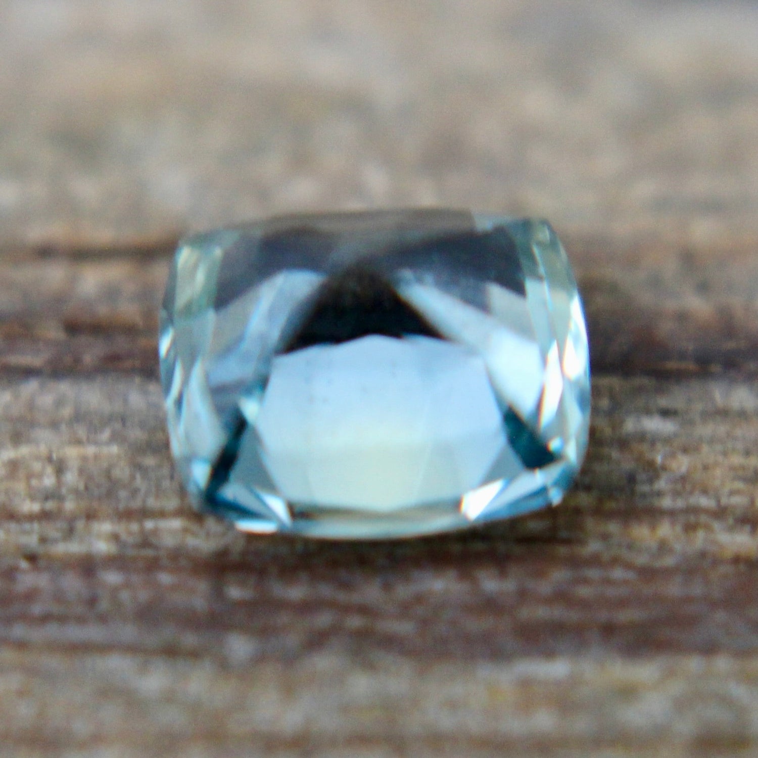 Unheated green sapphire 5.45×4.88×3.50 mm – side profile