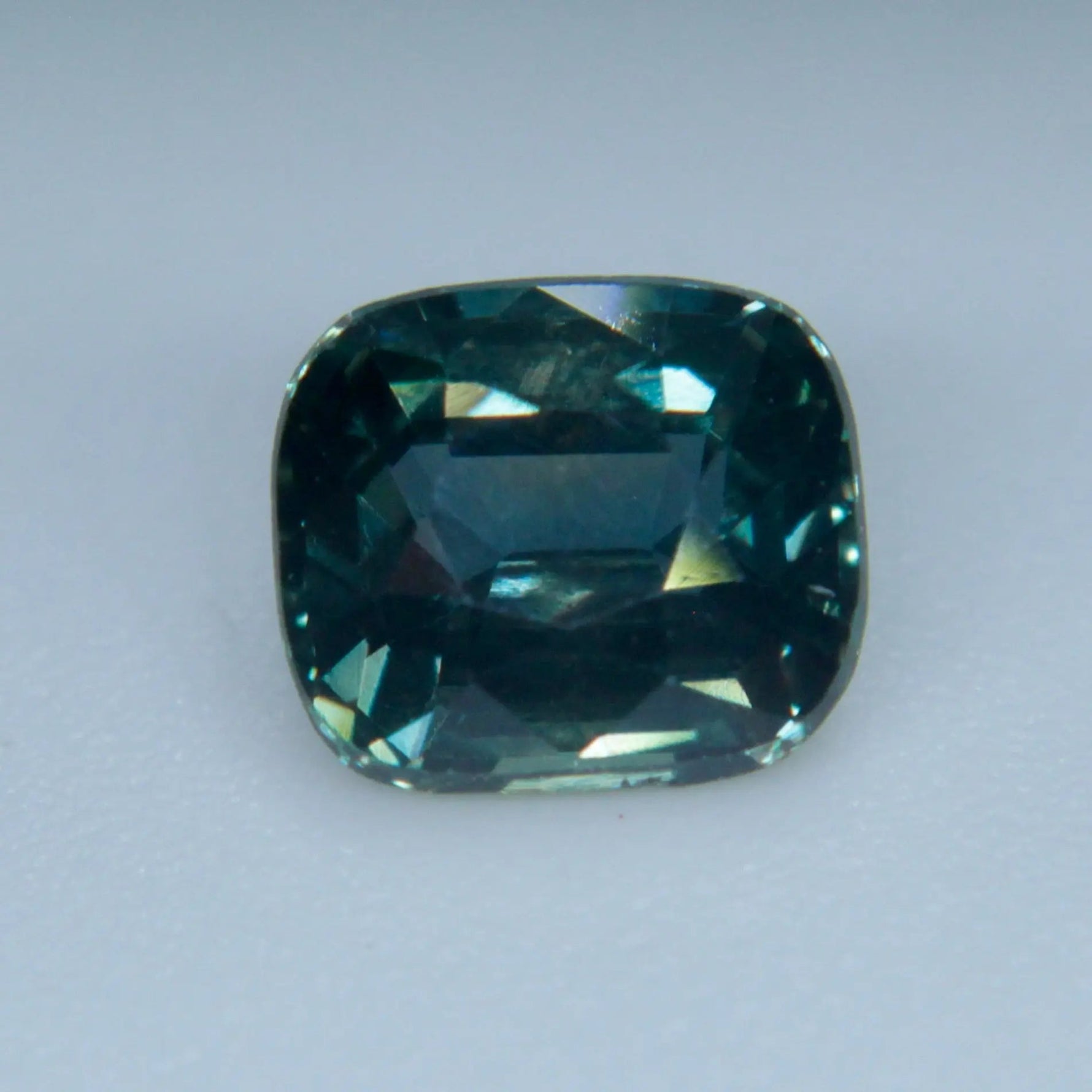 Earth sourced Ceylon green sapphire cushion cut for fine jewelry