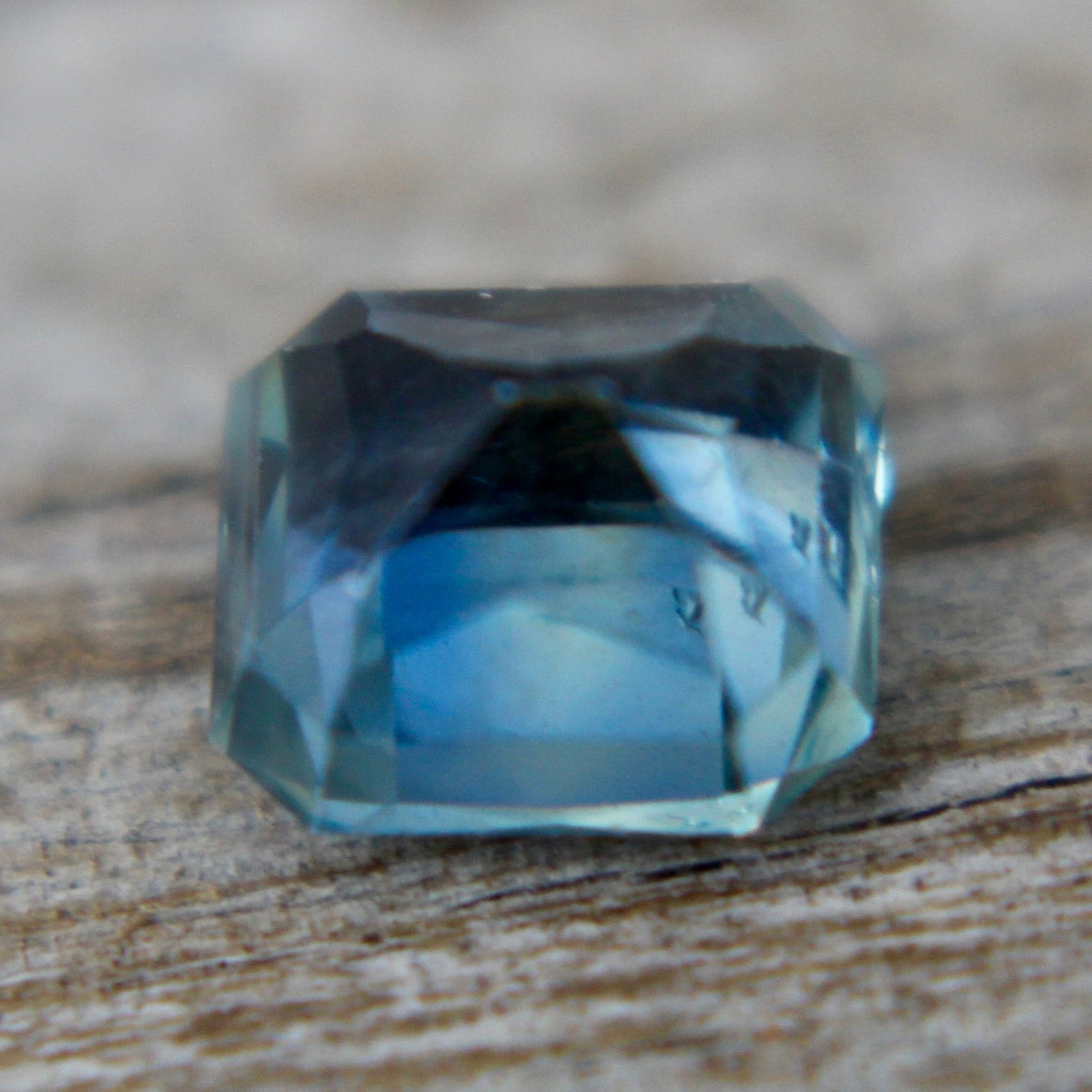 Unheated green sapphire 5.58×5.26×3.55 mm – step-cut profile