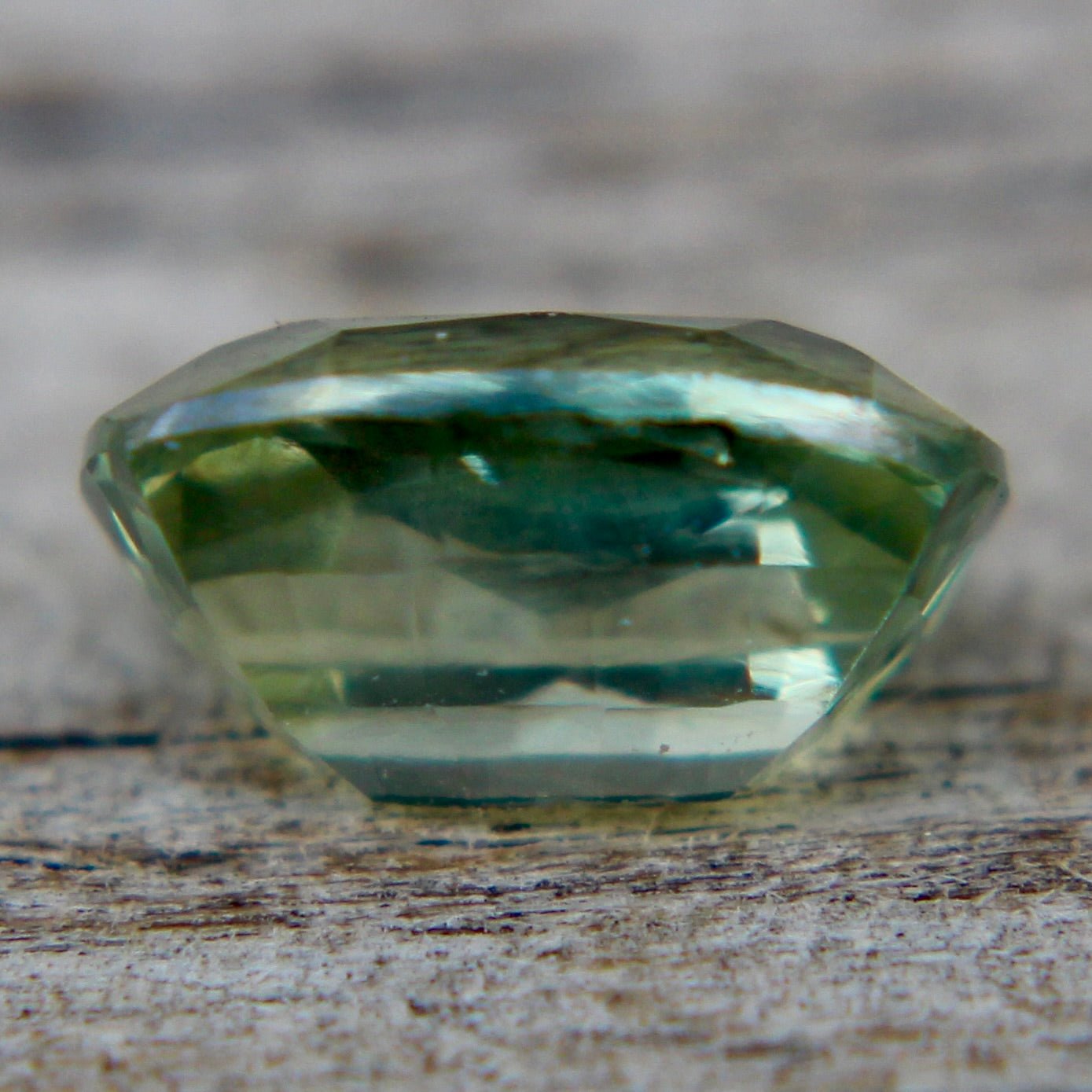 Untreated cushion cut green sapphire 0.76 carat for fine jewelry