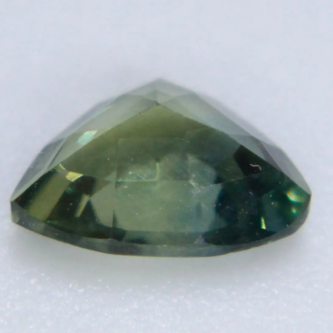 0.66ct Madagascar green sapphire trillion cut for custom jewelry design