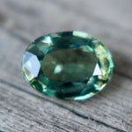 Untreated natural green sapphire with gemstone authenticity confirmation