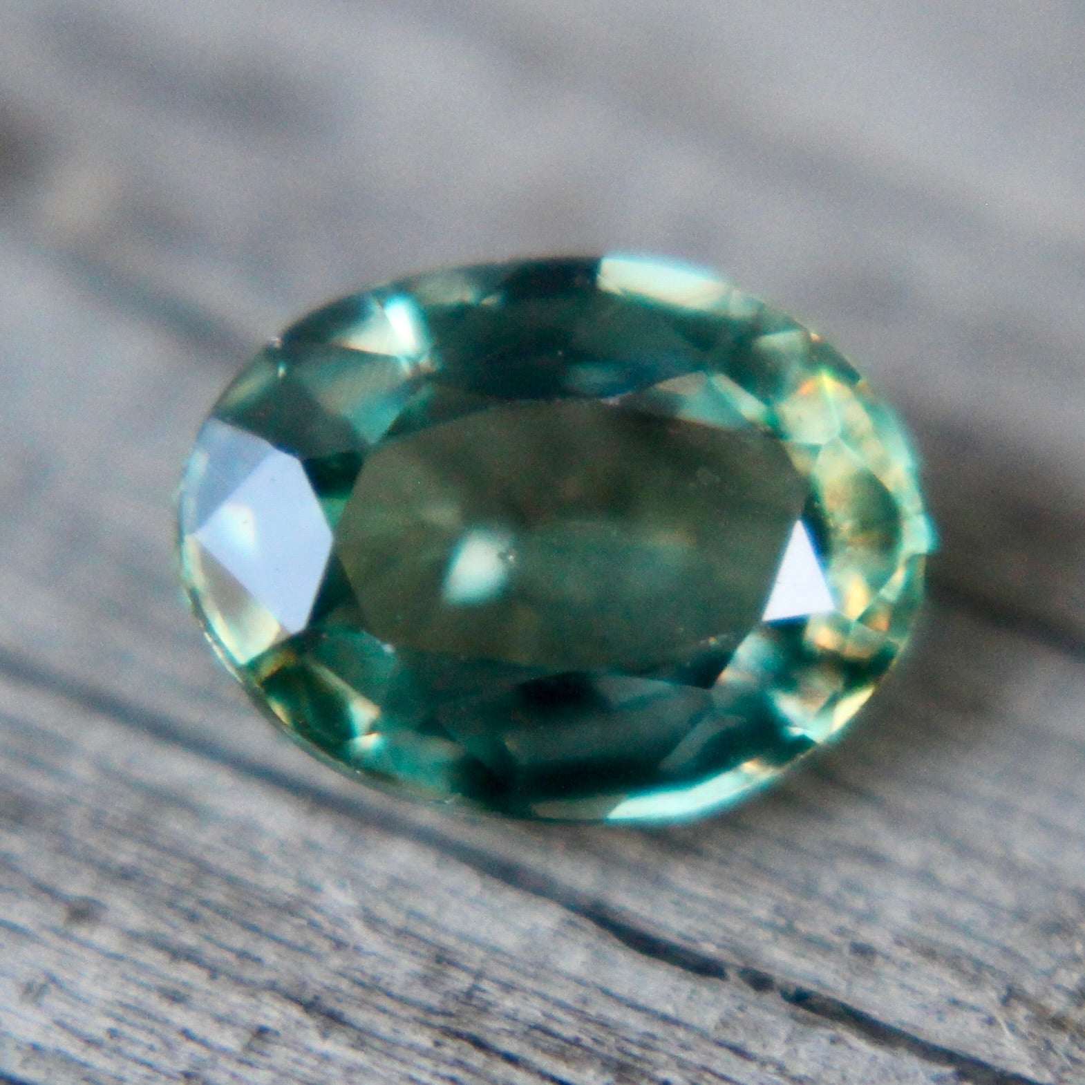 Untreated natural green sapphire with gemstone authenticity confirmation