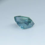 Ceylon green corundum with bright step-facet flashes
