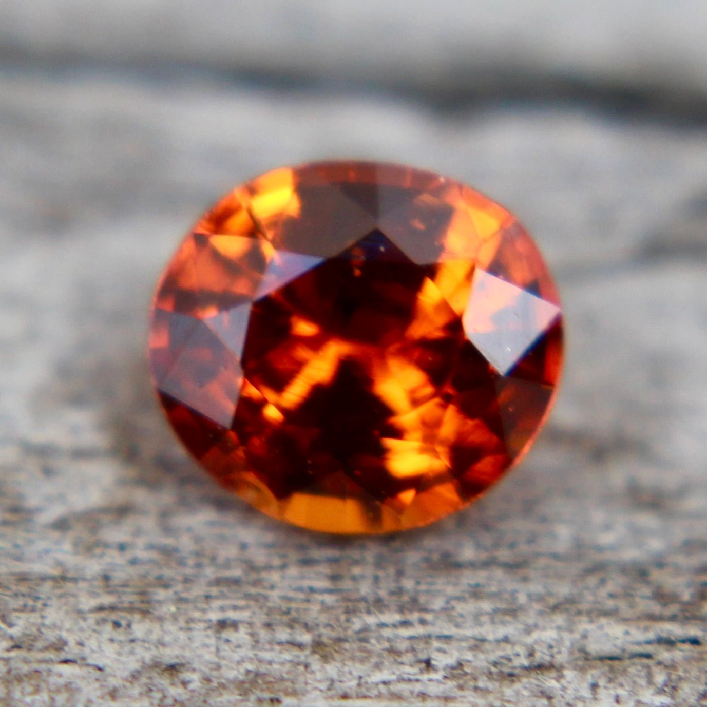 Orange sapphire 4.33 × 3.90 mm oval, heated, loose gemstone