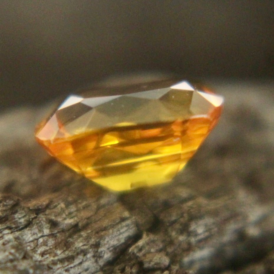 Heated Ceylon yellow sapphire 1.05 carat cushion cut stone with intense color