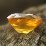 Heated Ceylon yellow sapphire 1.01 carat cushion cut stone with intense color