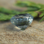 Side profile of oval pale blue sapphire showing 4.23mm depth