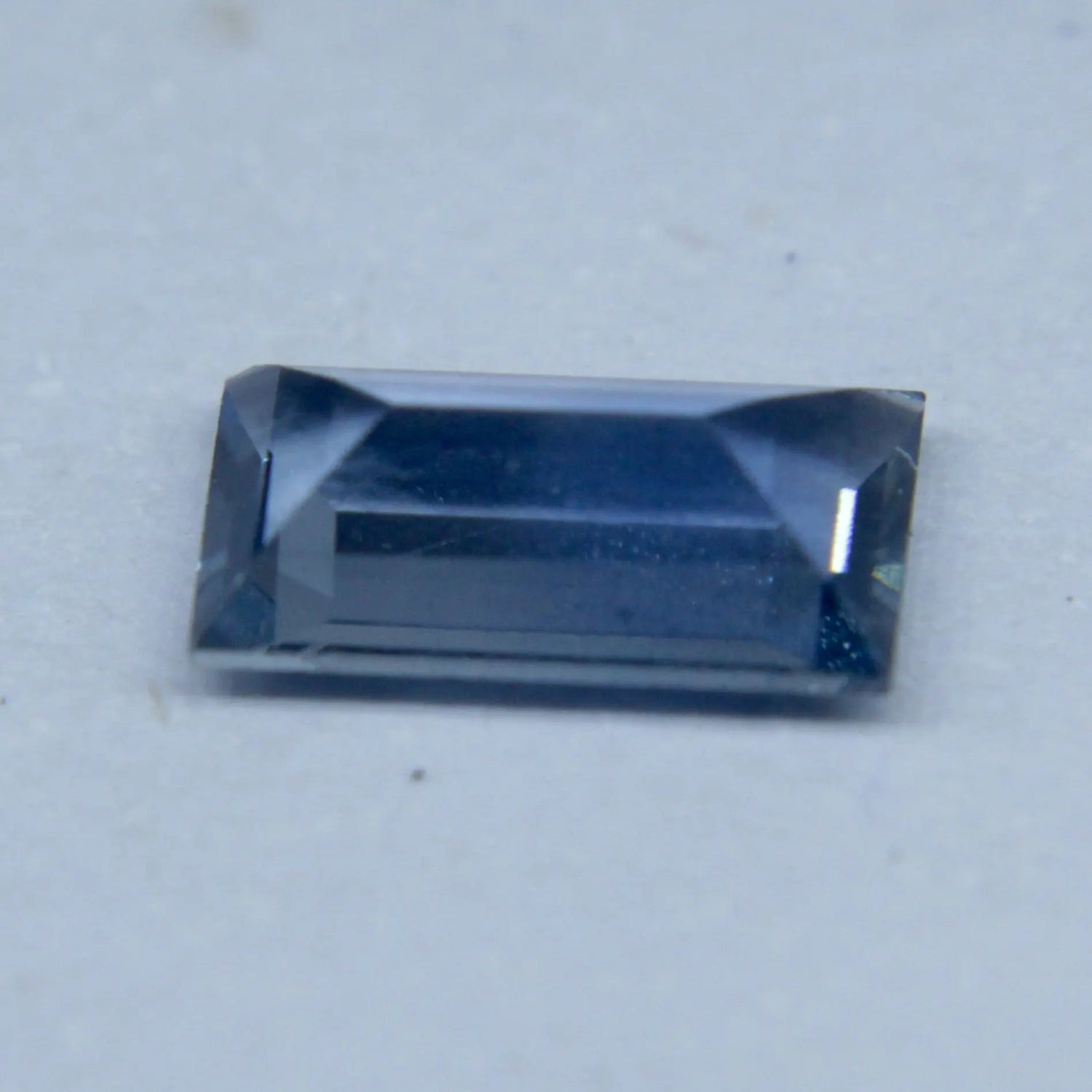 Eye clean pale blue Ceylon sapphire 7.10 x 4.00 mm baguette cut by Sapphire Pal