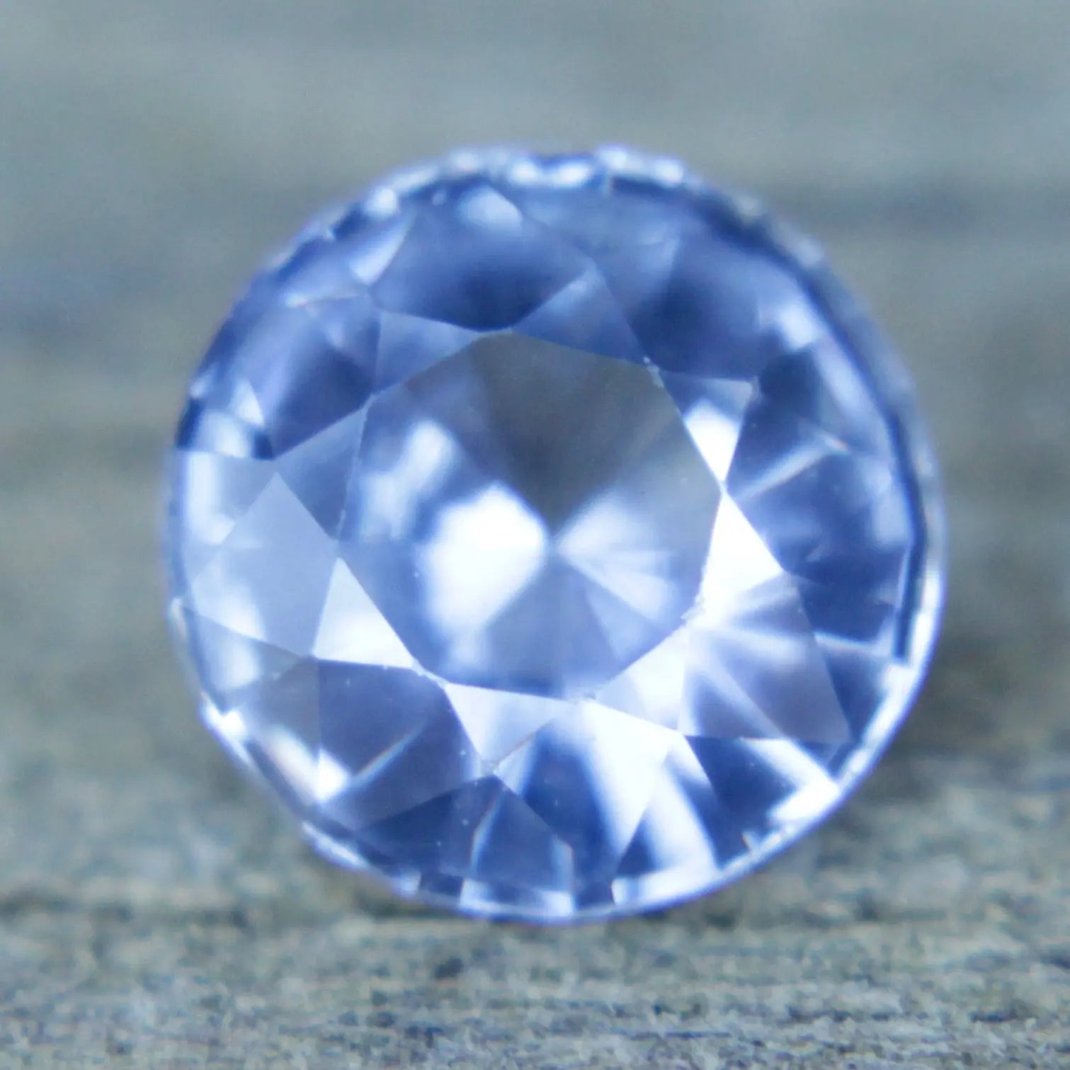 Faceted round cut pale blue sapphire 1.12ct earth mined gemstone