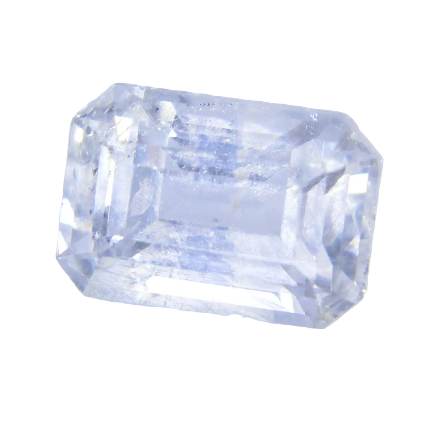 Side profile of heated pale blue sapphire, I clarity, emerald cut