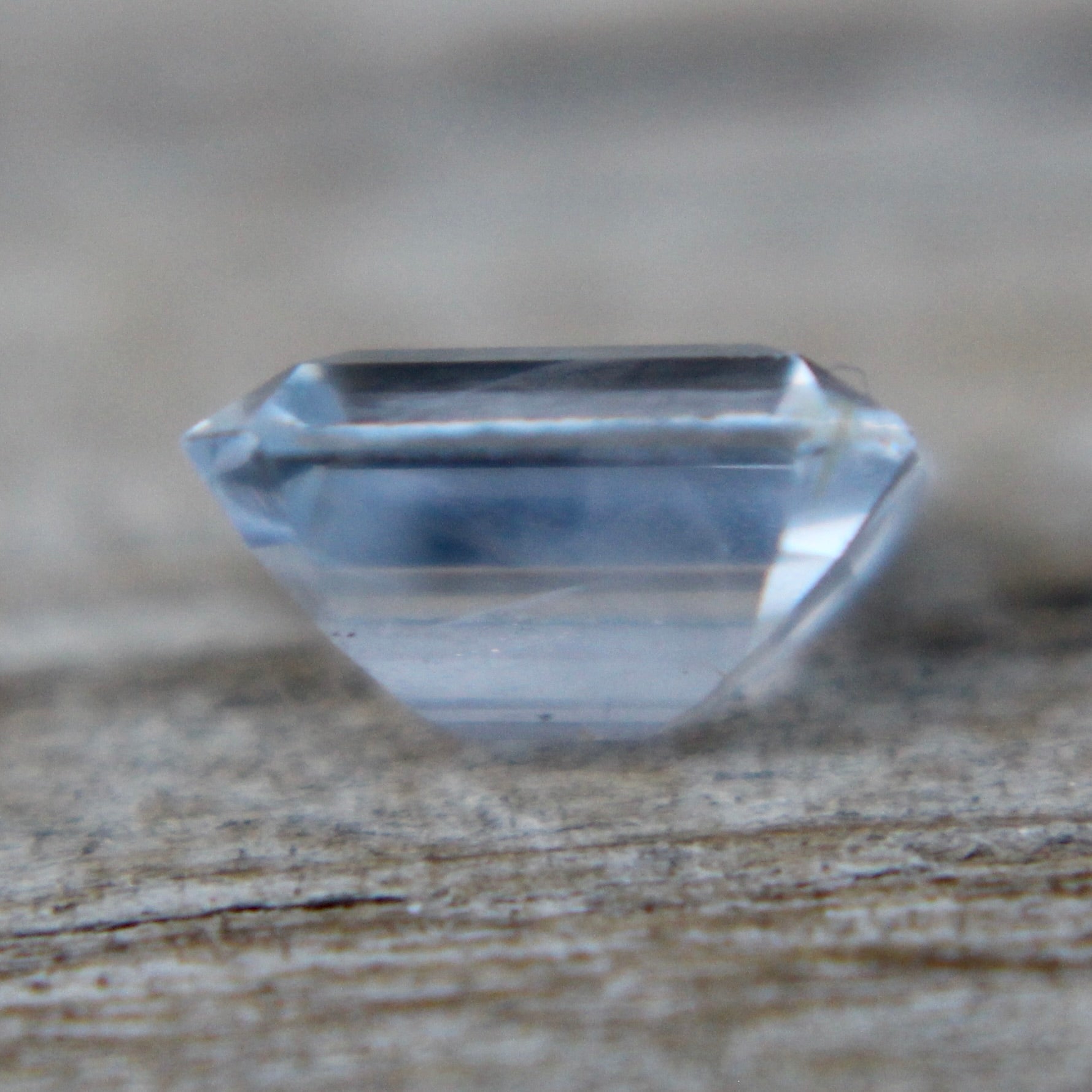 Ceylon pale blue sapphire measured on calipers at 6.00 × 4.18 mm