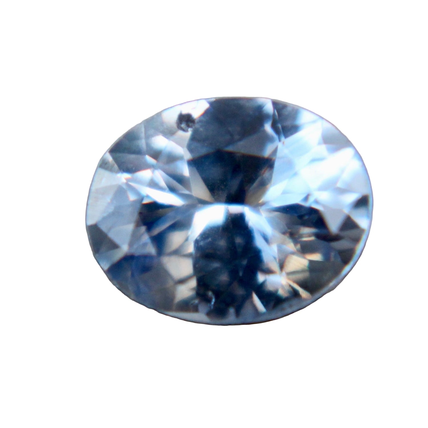 0.72ct pale blue sapphire, oval 6.17×5.00mm, Ceylon origin – face-up