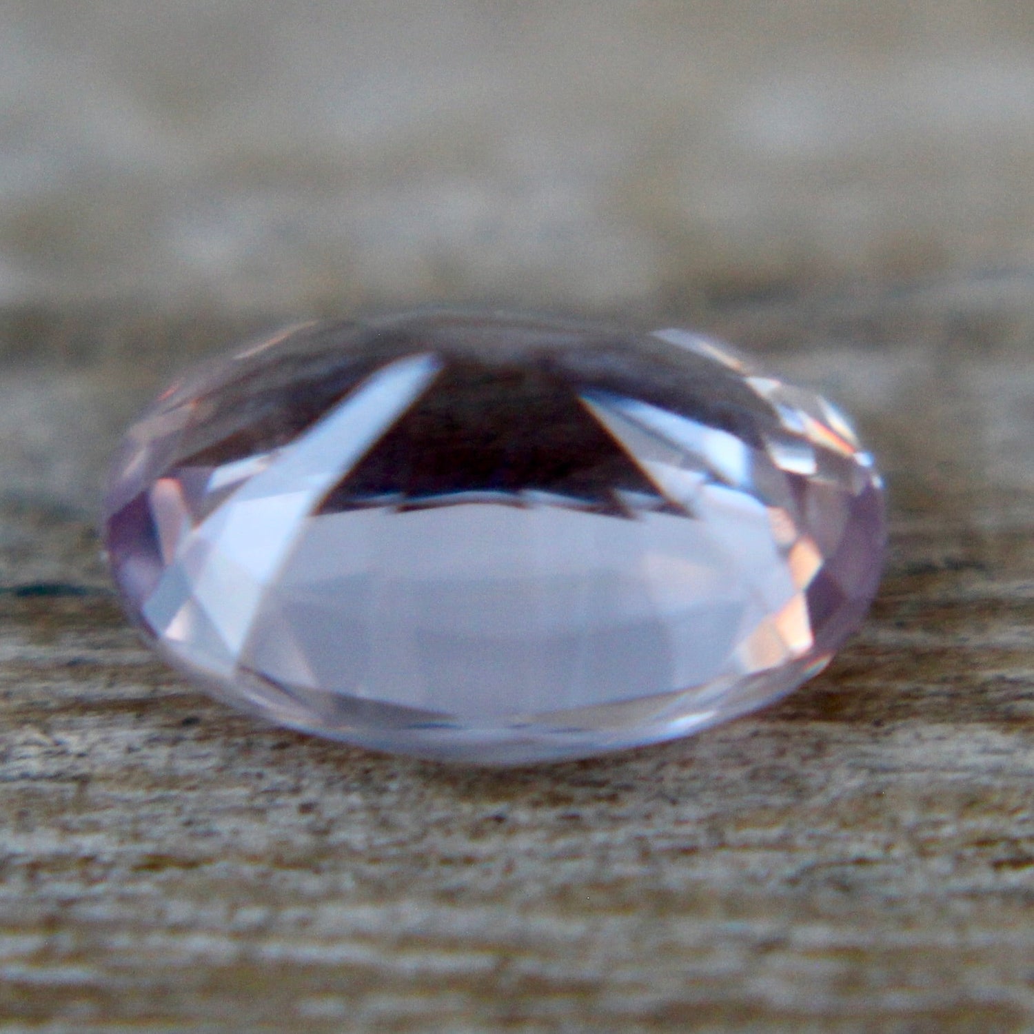Pink purple sapphire 7.05×5.02×3.35 mm oval precision-cut loose gemstone