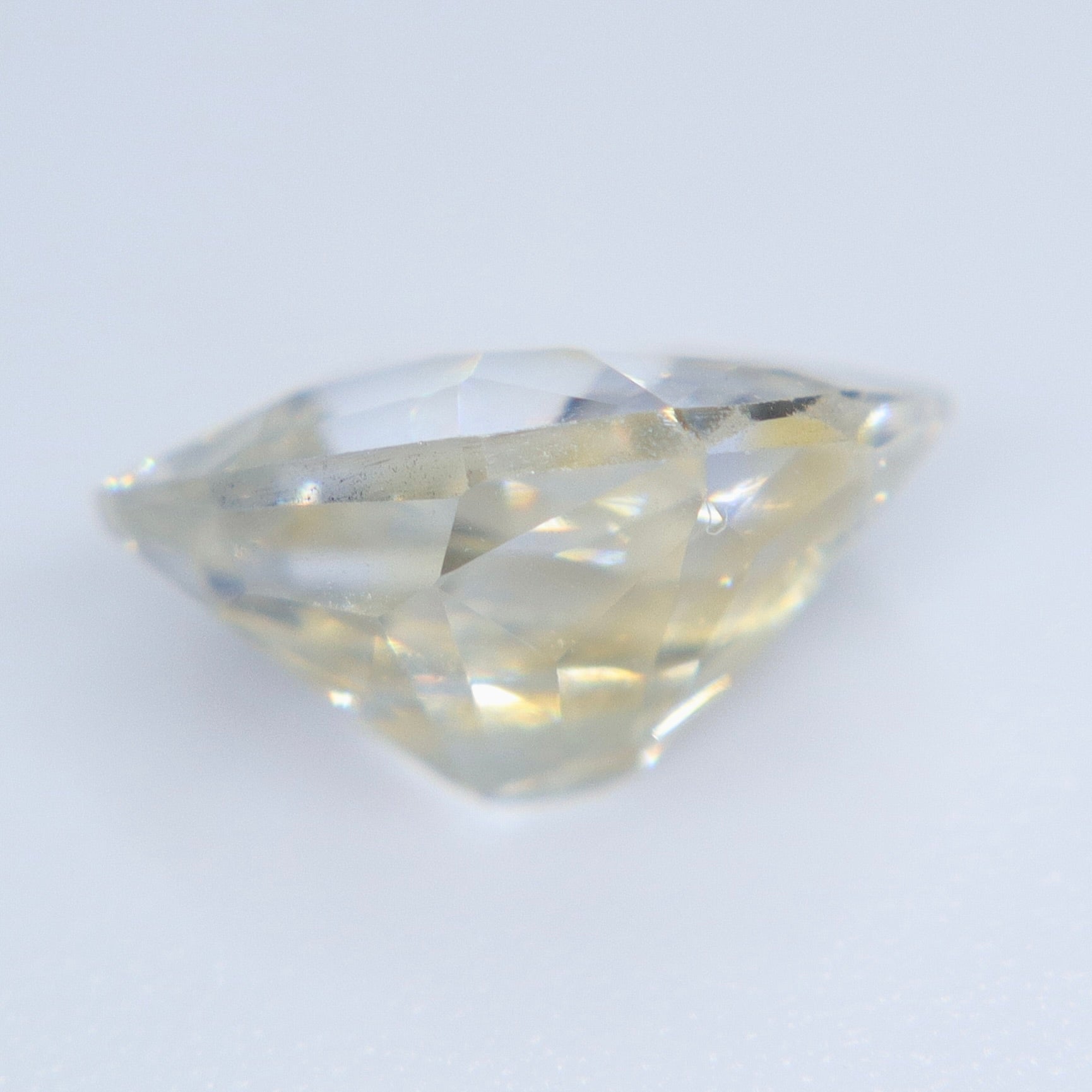 Natural Pale Yellow Sapphire (Blue Undertone, Heated) – 1.90 ct Freeform Loose Ceylon Sapphire | SI - Sapphirepal