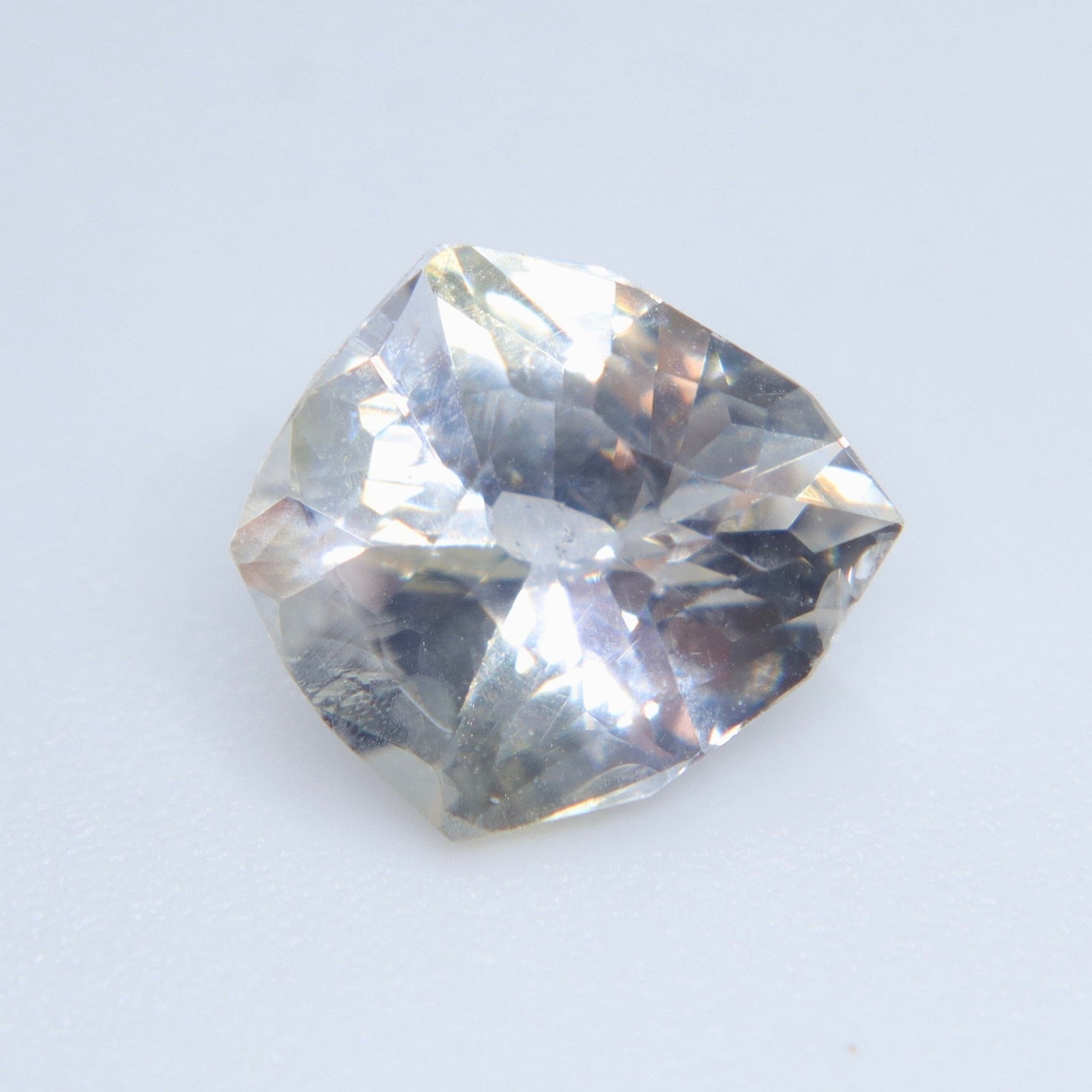 Natural Pale Yellow Sapphire (Blue Undertone, Heated) – 1.90 ct Freeform Loose Ceylon Sapphire | SI - Sapphirepal