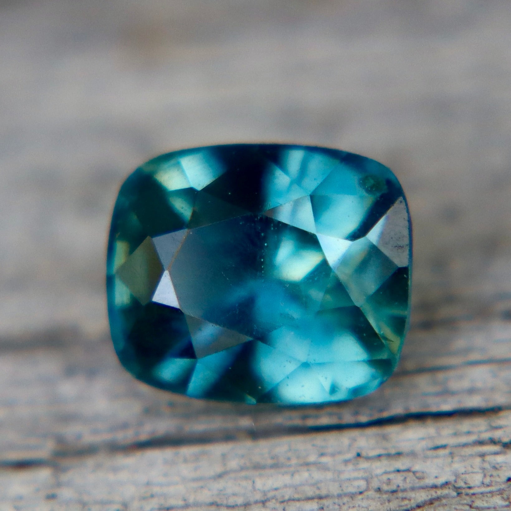 Natural Peacock Sapphire – 1.02 Carat Unheated Cushion Cut | Teal Blue Green Sapphire from Madagascar - Sapphirepal
