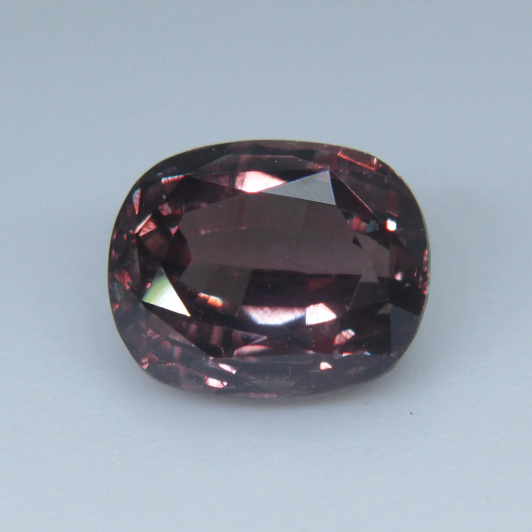 Cushion cut unheated sapphire gemstone pink brown color