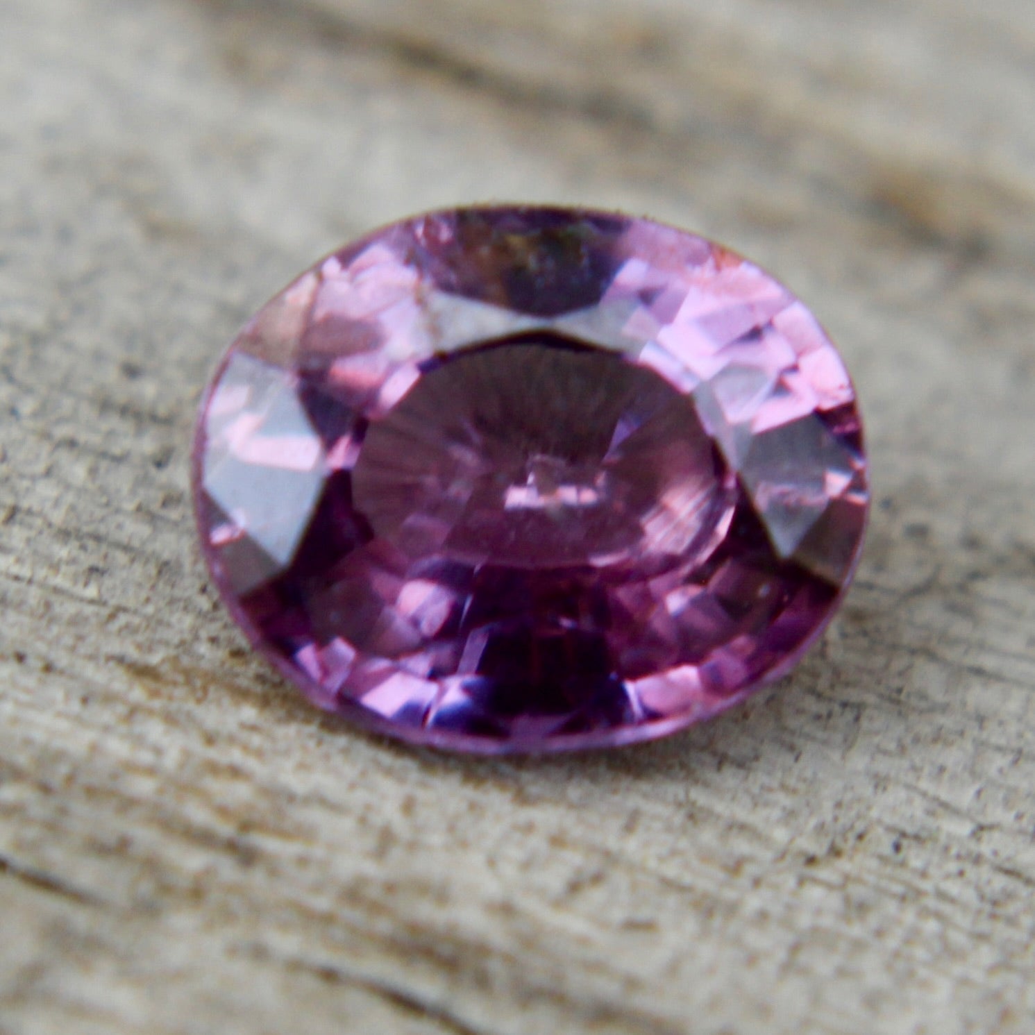 Earth-sourced pink purple sapphire with bright sparkle