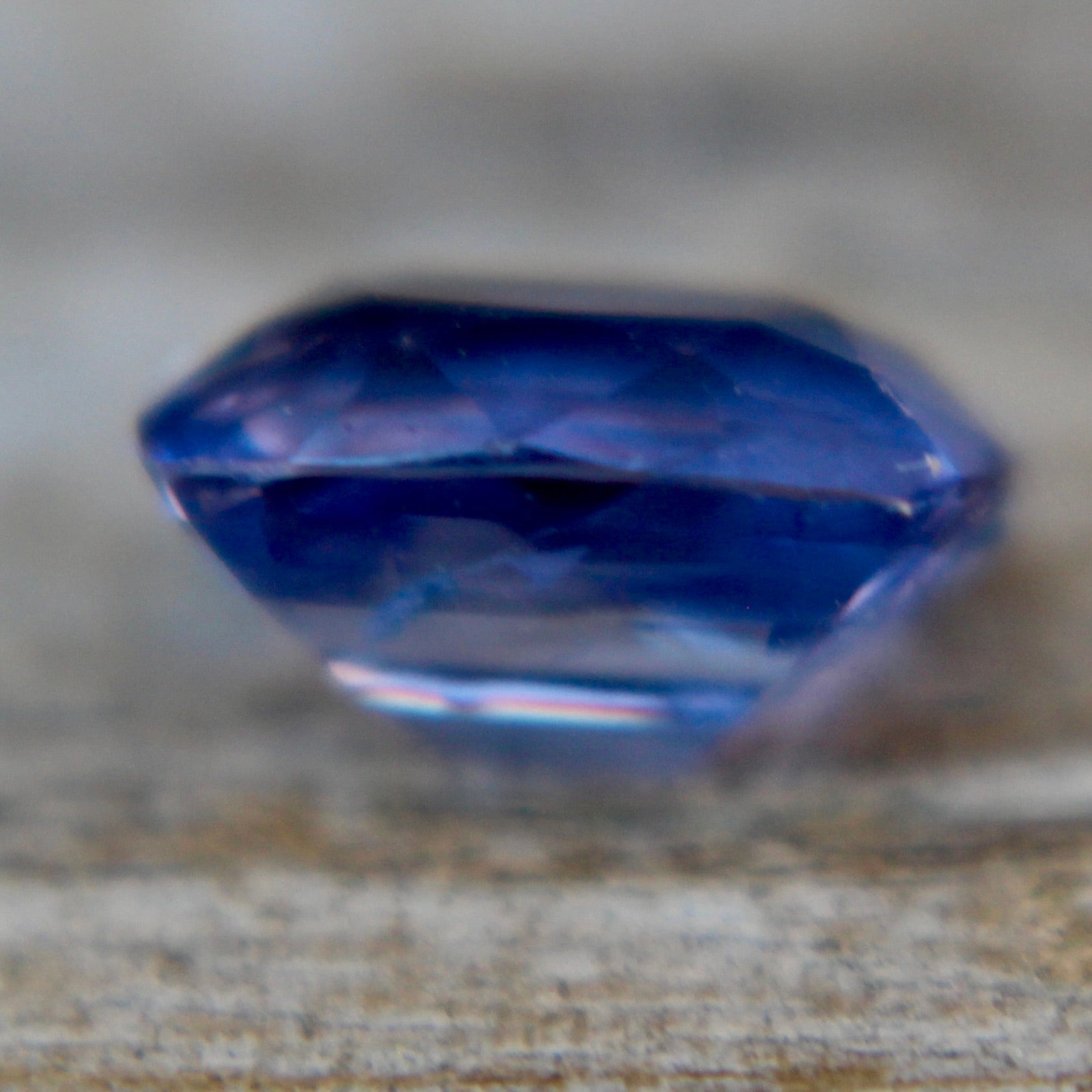 Unheated purple sapphire 6.90×5.23×3.76 mm – side profile