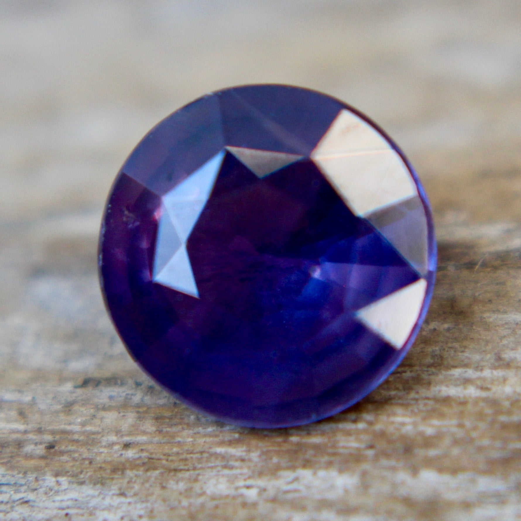 Earth-sourced purple sapphire, VS clarity, round cut