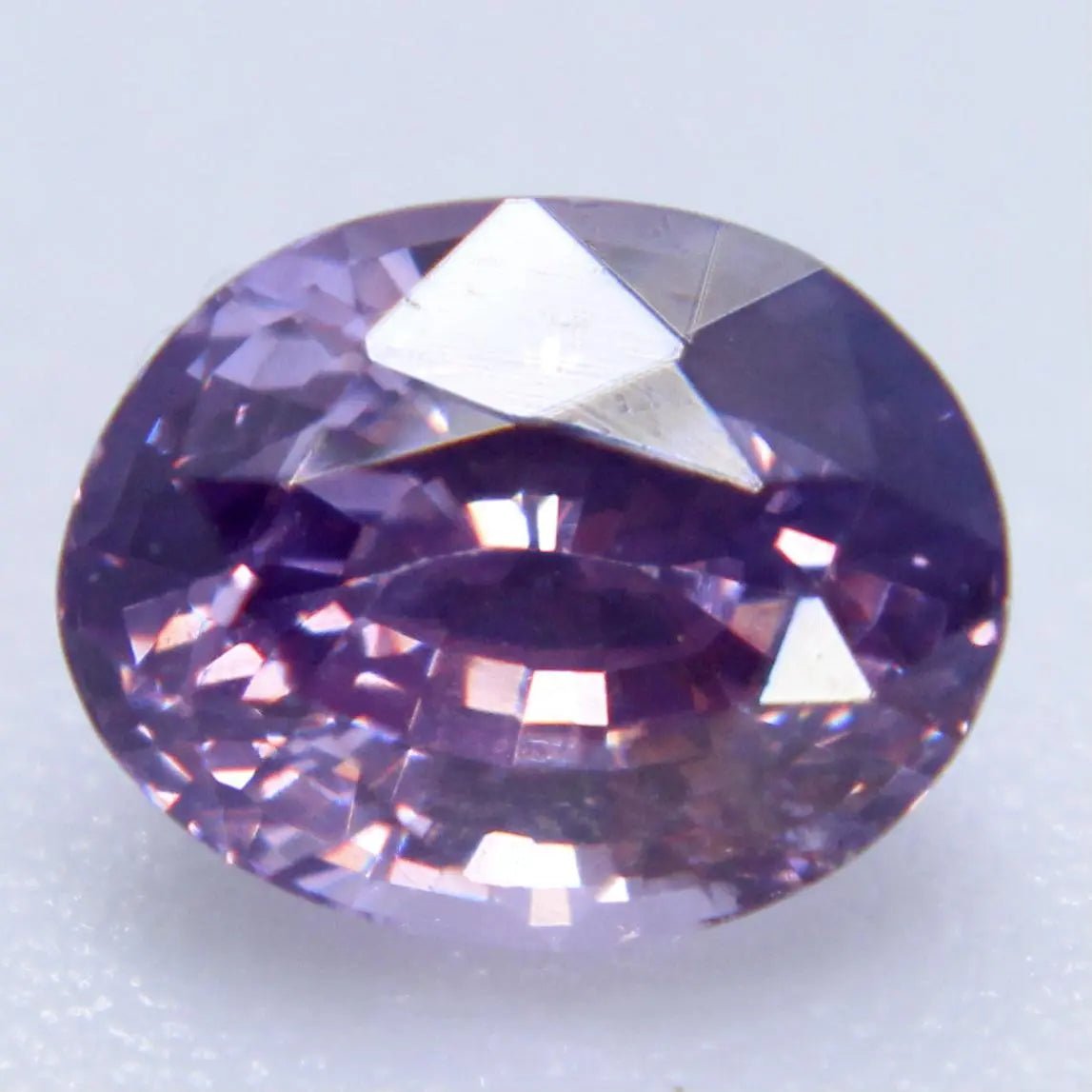Unheated Ceylon purple sapphire gemstone with fine cut and polish