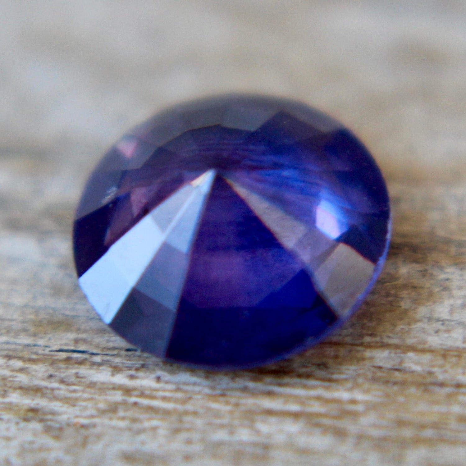 Untreated round purple sapphire with bright brilliance