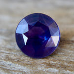 Side profile of round purple sapphire, depth 2.95 mm