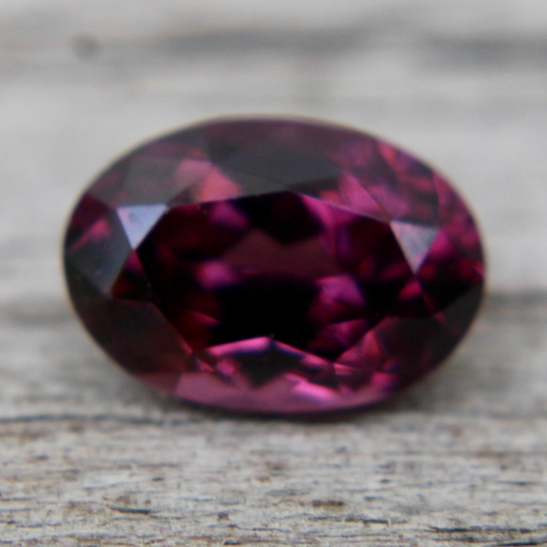 Natural pinkish purple spinel side profile showing 3.76 mm depth