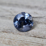 Back view showing the faceting of a natural SI clarity purple spinel