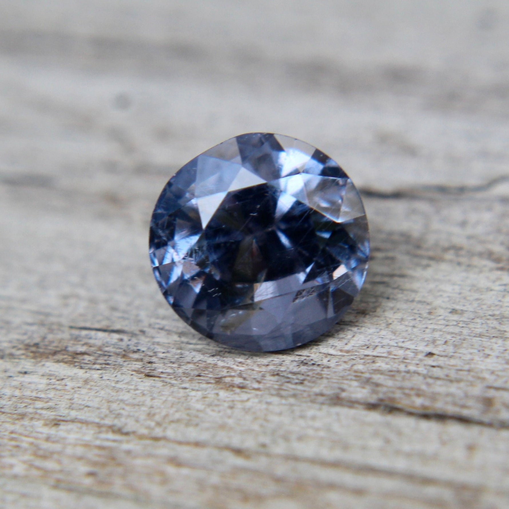 Back view showing the faceting of a natural SI clarity purple spinel