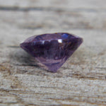 Ceylon purple spinel measured on calipers at 6.02 mm diameter