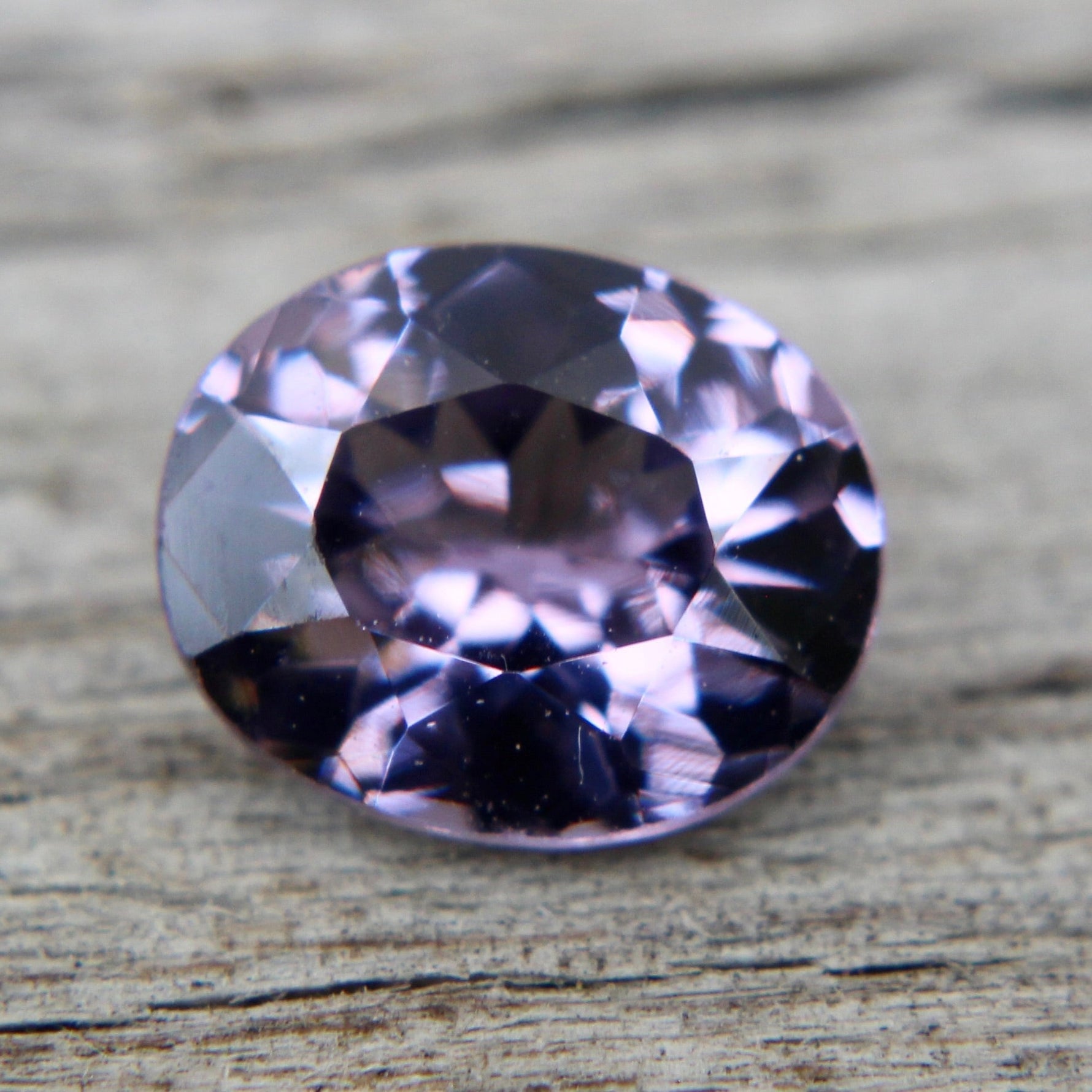 Ceylon purple spinel with lively brilliance