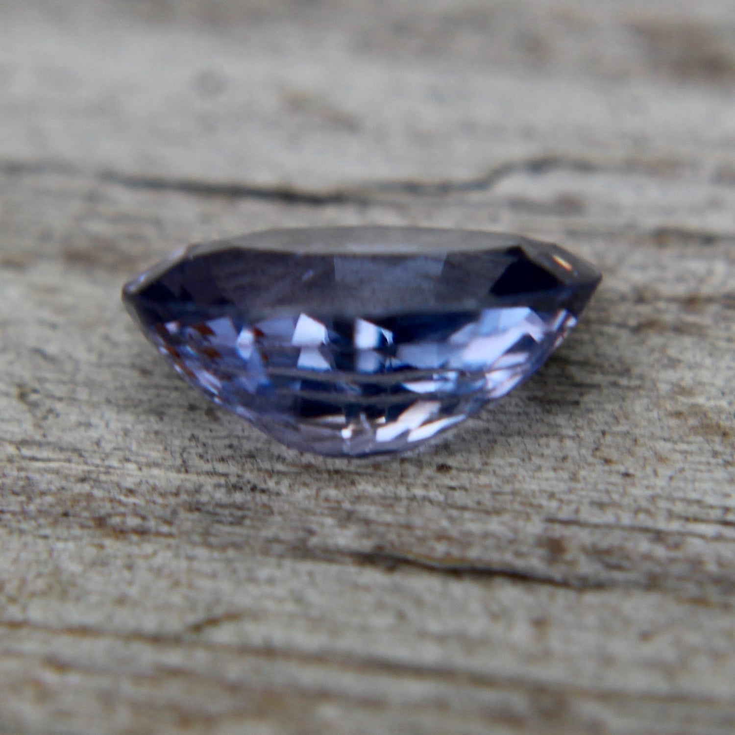 Ceylon purple spinel oval 8.27×6.67×3.84 mm – cut and polished faceted gemstone