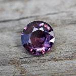 Untreated purple spinel gemstone under natural light – certified authenticity