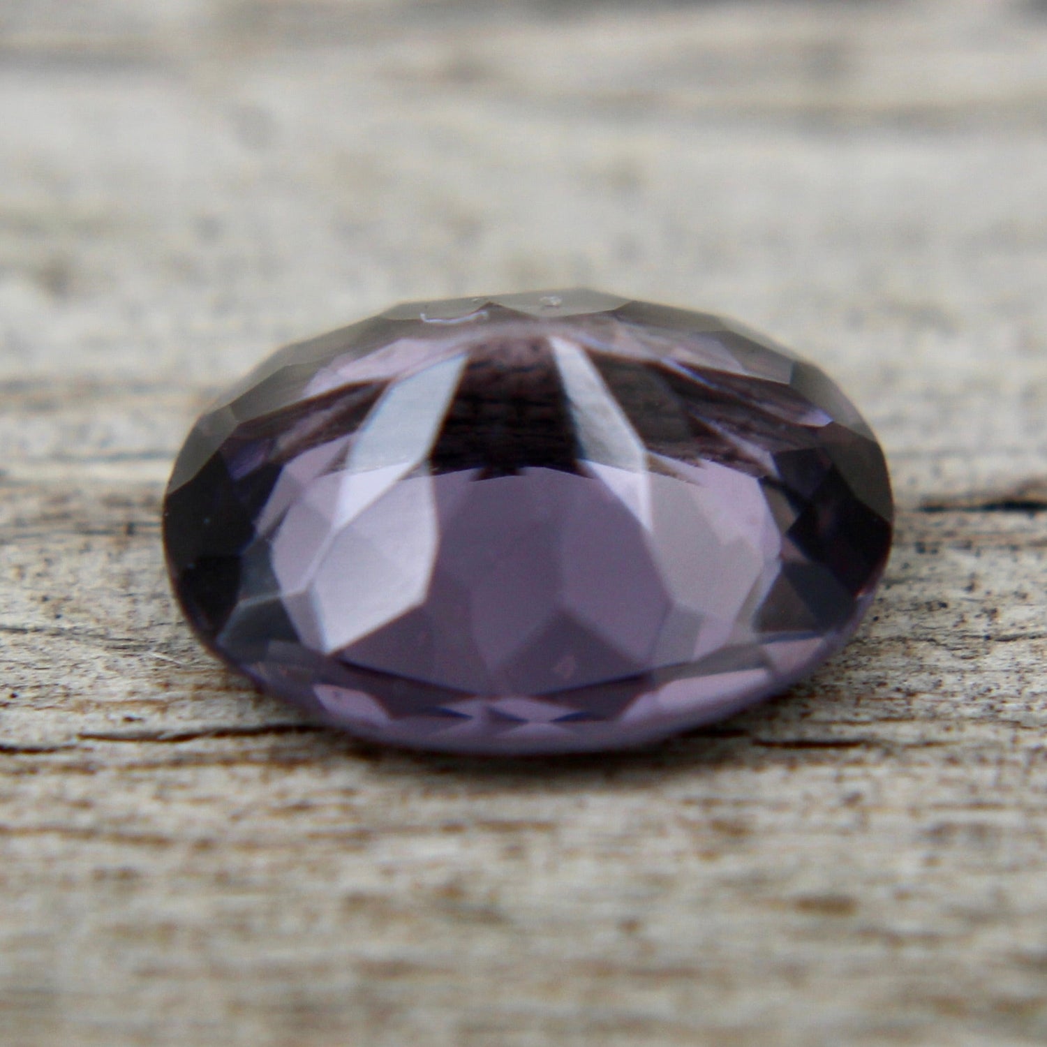 High-clarity purple spinel 6.83×5.67×3.35 mm – side profile