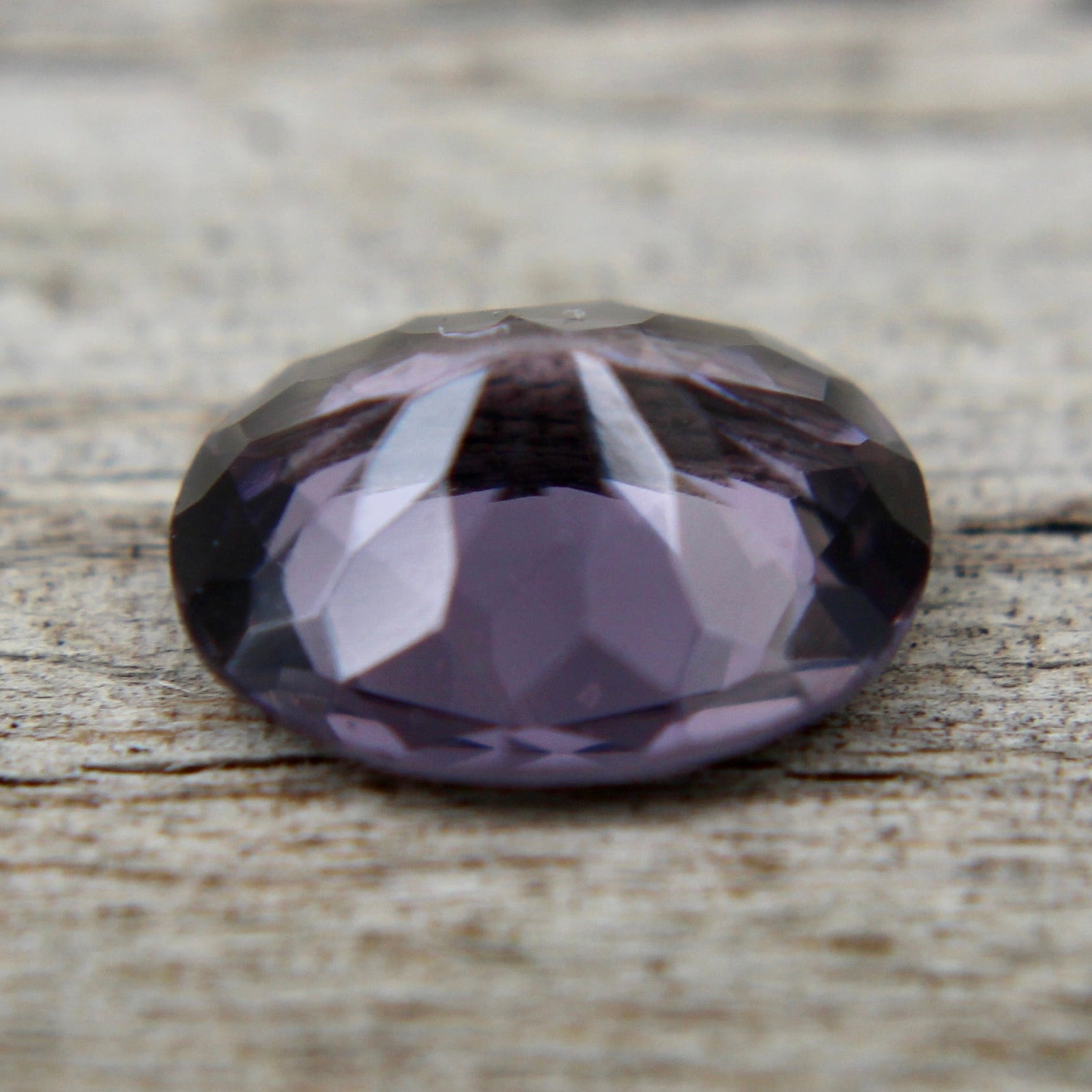 High-clarity purple spinel 6.83×5.67×3.35 mm – side profile